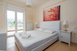 Postel nebo postele na pokoji v ubytování Villa Dias