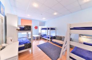 Postel nebo postele na pokoji v ubytování Central Hostel