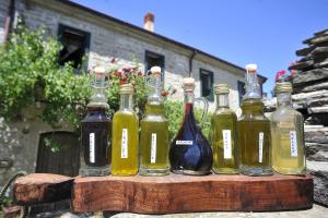 a group of wine bottles sitting on a table at chevalier claudio in Agnone +40 photos