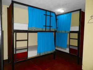 Palanda nebo palandy na pokoji v ubytování Posada Doña Luisa