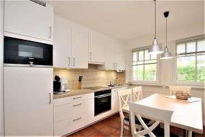 Η κουζίνα ή μικρή κουζίνα στο Wiesenweg 4a, Whg 2