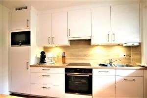 Η κουζίνα ή μικρή κουζίνα στο Wiesenweg 4a, Whg 2 +12 φωτογραφίες