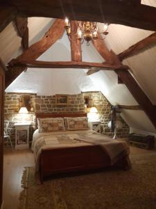 Llit o llits en una habitació de La Jolie Petite Maison for groups 1-6