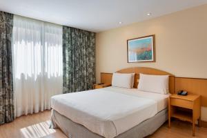 Windsor Martinique Copacabana客房内的一张或多张床位