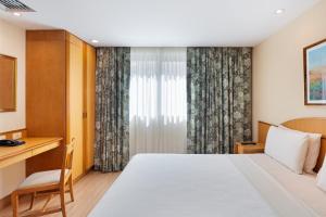 Windsor Martinique Copacabana客房内的一张或多张床位
