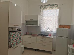 Kuchyň nebo kuchyňský kout v ubytování Casa BiaBella