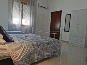 Postel nebo postele na pokoji v ubytování Casa BiaBella