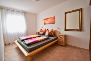 Posteľ alebo postele v izbe v ubytovaní Apartmani Solis