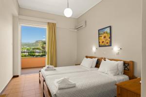 Posteľ alebo postele v izbe v ubytovaní Lefktron Hotel + 37 fotografií