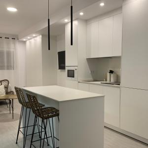 Kuchyň nebo kuchyňský kout v ubytování Lovely suites Tarifa, estudio a estrenar en el centro y muy cerca de la playa