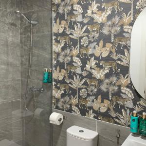 Koupelna v ubytování Lovely suites Tarifa, estudio a estrenar en el centro y muy cerca de la playa + 20 fotografií