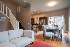 a living room with a couch and a table at Aspen Lodge by Revelstoke Vacations in Revelstoke