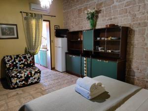 Postel nebo postele na pokoji v ubytování Donna Isabella