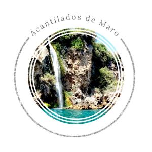 a waterfall in a circle with the words miracles do magic at Acantilados De Maro in Maro
