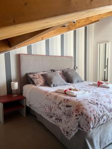 A bed or beds in a room at Interno7 Rooms