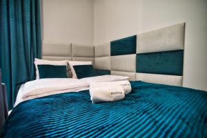 Posteľ alebo postele v izbe v ubytovaní Apartament Emi Zator by Housine