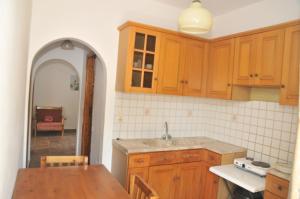 Kuchyň nebo kuchyňský kout v ubytování Kaikas Studios & Apartments + 21 fotografií