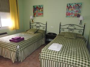 Llit o llits en una habitació de La Morada Casa Rural
