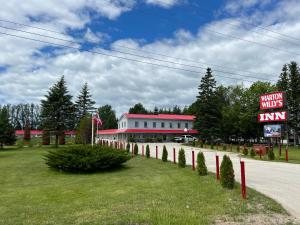 a building with a sign that reads virgin mills inn at Wiarton Willys Inn in Wiarton
