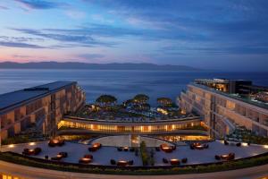 a view of a hotel at night at Secrets Bahia Mita Surf and Spa - All Inclusive - Adults Only in Punta Mita