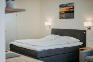 Voodi või voodid majutusasutuse Chill & Relax Apartments in Neusiedl am See toas