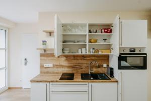 Köök või kööginurk majutusasutuses Chill & Relax Apartments in Neusiedl am See