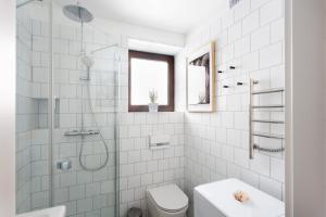 Kúpeľňa v ubytovaní Szumiwoda Apartamenty Kuźnica