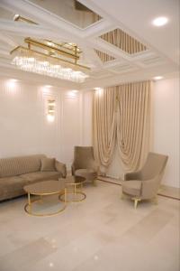 Χώρος καθιστικού στο Anga Yerevan Hotel
