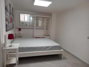 Posteľ alebo postele v izbe v ubytovaní Ombrellorosso