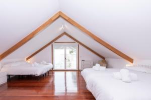 Postel nebo postele na pokoji v ubytování CASA PLAYA DE LIMENS