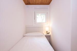 Postel nebo postele na pokoji v ubytování CASA PLAYA DE LIMENS