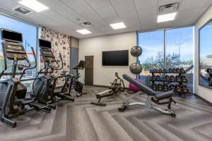 a gym with several treadmills and cardio equipment in a room at Vīb Hotel by Best Western Phoenix - Tempe in Tempe +35 photos