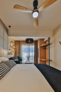 En eller flere senge i et værelse på Villa veranda