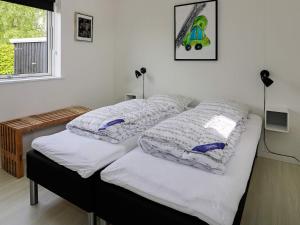 Katil atau katil-katil dalam bilik di Holiday Home Haslevgårde