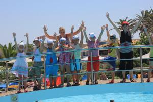 a number of people standing on top of a swimming pool at Annabelle Beach Resort in Hersonissos