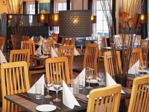 Restaurace v ubytování 4 person apartment in holiday park Blokhus + 11 fotografií