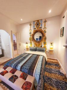 Una cama o camas en una habitación de Art riad mazighen