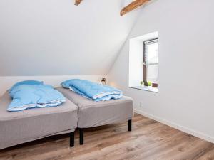 Ένα ή περισσότερα κρεβάτια σε δωμάτιο στο Holiday home Haderslev XLIV