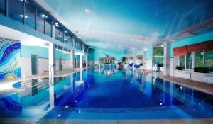 Bazén v ubytování Park Hotel Berezka nebo v jeho okolí