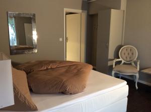 Postel nebo postele na pokoji v ubytování Landcafe mit Mini Hotel