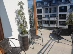 Balkon lub taras w obiekcie VillaPegaz19-150m von Strand entfernt