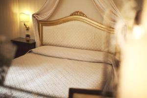 Postel nebo postele na pokoji v ubytování Hotel Ca' D'Oro - WENICE Deep Culture