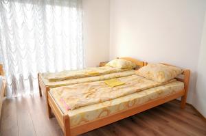Postel nebo postele na pokoji v ubytování Hostel Room