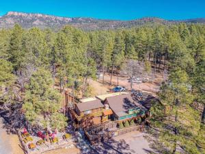 an aerial view of a house in the woods at Luxury Glamper Retreat 14 Forest Site in Payson