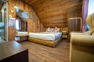 Postel nebo postele na pokoji v ubytování Zambala Retreat & Spa Darjeeling