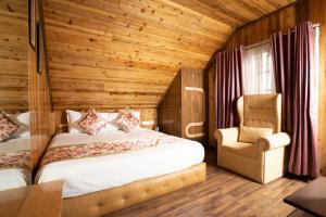 Postel nebo postele na pokoji v ubytování Zambala Retreat & Spa Darjeeling