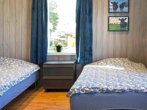 เตียงในห้องที่ 5 person holiday home in Svelgen-By Traum