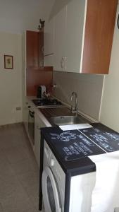 A cozinha ou kitchenette de Signorile Appartamento