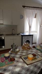 Кухня или мини-кухня в Signorile Appartamento
