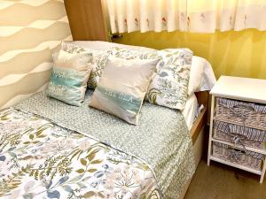 A bed or beds in a room at Sunset chill out
